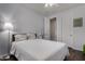 Cozy bedroom with a comfortable bed, soft lighting, and a calming atmosphere at 21602 N 36Th St, Phoenix, AZ 85050