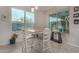Bright breakfast nook with large windows and views of the backyard at 21602 N 36Th St, Phoenix, AZ 85050