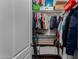 Spacious walk-in closet with shelving for easy storage of belongings and personal items at 21602 N 36Th St, Phoenix, AZ 85050