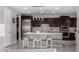 Modern kitchen with stainless steel appliances, a center island, and stylish pendant lighting at 21602 N 36Th St, Phoenix, AZ 85050