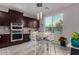 Kitchen features a breakfast nook with large window and stainless steel appliances at 21602 N 36Th St, Phoenix, AZ 85050