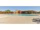 Resort-style community pool with shaded lounge areas at 21602 N 36Th St, Phoenix, AZ 85050