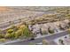 Street view of a neighborhood with desert landscaping and hardscaping, manicured shrubbery, and solar panels at 21602 N 36Th St, Phoenix, AZ 85050