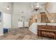 Grand foyer showcasing high ceilings, a staircase with wooden railing, and decorative furniture pieces at 2257 E Redwood Ct, Chandler, AZ 85286