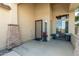 Inviting front porch with decorative stone accents and a seating area at 2257 E Redwood Ct, Chandler, AZ 85286