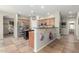 Bright kitchen features stainless steel appliances, wood cabinets, and tile flooring at 2257 E Redwood Ct, Chandler, AZ 85286