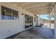 Covered back patio with access to the home's interior and backyard at 2338 E Folley St, Chandler, AZ 85225