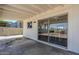 Outdoor patio area with a sliding glass door leading to the interior at 2338 E Folley St, Chandler, AZ 85225