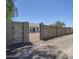 View of the backyard with a concrete block fence at 2338 E Folley St, Chandler, AZ 85225
