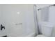 This bathroom has a white bathtub and toilet with a shower and towel rack at 2338 E Folley St, Chandler, AZ 85225