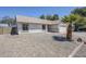 Single story home featuring neutral stucco exterior, desert landscaping and a two-car garage at 2338 E Folley St, Chandler, AZ 85225