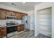 The kitchen features stainless steel appliances, a pantry, and sleek countertops at 2338 E Folley St, Chandler, AZ 85225