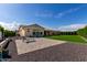 Backyard featuring a patio, artificial turf, and desert landscaping offering low maintenance and space for outdoor enjoyment at 25875 S 227Th Way, Queen Creek, AZ 85142