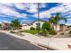 Lovely single-story home featuring a three-car garage, desert landscaping, and a neatly kept lawn at 25875 S 227Th Way, Queen Creek, AZ 85142