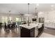 Spacious open-concept kitchen flows into the living and dining areas, great for entertaining at 25875 S 227Th Way, Queen Creek, AZ 85142