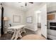 Functional office area with large desk, white board, decor, and modern furnishings at 25875 S 227Th Way, Queen Creek, AZ 85142