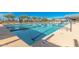 Community swimming pool with lane dividers, accessible handrails, and shallow end markings for safety and convenience at 25875 S 227Th Way, Queen Creek, AZ 85142