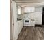 Compact kitchen with white appliances and cabinets at 2650 W Union Hills Dr # 331, Phoenix, AZ 85027