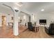 Open-concept living space featuring tile flooring, white walls, and recessed lighting at 2745 S Emerson Cir, Mesa, AZ 85210