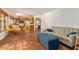 Stylish living room featuring tile floors, wood cabinetry, and access to outdoor area at 2745 S Emerson Cir, Mesa, AZ 85210