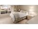 Bright bedroom with plush carpeting, beautiful lighting, and an expansive view at 2926 N 149Th Dr, Goodyear, AZ 85395