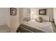 Comfortable bedroom featuring calm color palette, a large window, and bright accents at 2926 N 149Th Dr, Goodyear, AZ 85395