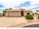 Charming single-story home with a spacious two-car garage, desert landscaping, and a neutral-toned stucco exterior at 2926 N 149Th Dr, Goodyear, AZ 85395