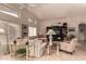 Spacious living room with tile flooring, high ceilings, comfortable furnishings, and lots of natural light at 2926 N 149Th Dr, Goodyear, AZ 85395