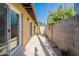 Enclosed back patio with concrete flooring and low-maintenance desert landscaping at 3033 N 39Th St # 5, Phoenix, AZ 85018