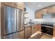 Kitchen with light wood cabinets, stainless steel appliances, and sleek countertops, offering a modern and functional design at 3033 N 39Th St # 5, Phoenix, AZ 85018