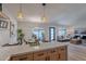 Open-concept kitchen with an island flows into the dining and living area, enhancing the home's spacious feel at 3033 N 39Th St # 5, Phoenix, AZ 85018