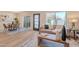 Bright and stylish living room seamlessly connects to a dining area, offering an open, airy feel to the home at 3033 N 39Th St # 5, Phoenix, AZ 85018