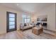 Bright living room with neutral furniture, a light-colored rug, a textured wood coffee table, and contemporary artwork at 3033 N 39Th St # 5, Phoenix, AZ 85018