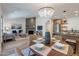 Open living space featuring a stylish living room, cozy fireplace, and modern kitchen and dining area at 3033 N 39Th St # 5, Phoenix, AZ 85018