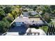 Aerial view of a landscaped property featuring unique turret design and mature trees at 333 W Bethany Home Rd, Phoenix, AZ 85013