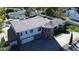Aerial of property showcasing the house's architecture, circular features, and driveway at 333 W Bethany Home Rd, Phoenix, AZ 85013