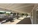 Large covered back porch with view of the pool and backyard at 333 W Bethany Home Rd, Phoenix, AZ 85013