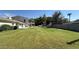 Expansive backyard featuring lush green lawn and a charming home, ideal for Gathering activities and relaxation at 333 W Bethany Home Rd, Phoenix, AZ 85013