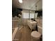 Modern bathroom features dual vanity, tub, and shower with stylish tile work at 333 W Bethany Home Rd, Phoenix, AZ 85013