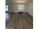 Spacious dining room with hardwood floors, modern lighting and views to the exterior at 333 W Bethany Home Rd, Phoenix, AZ 85013