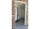 Inviting front entrance with double doors, stone accents, and a welcoming 'Hello' mat at 333 W Bethany Home Rd, Phoenix, AZ 85013