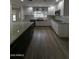 Kitchen with granite countertops, stainless steel appliances, and a dark island at 333 W Bethany Home Rd, Phoenix, AZ 85013