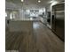 Gourmet kitchen featuring stainless steel appliances, white cabinetry, and granite countertops at 333 W Bethany Home Rd, Phoenix, AZ 85013