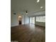 Open living room with hardwood floors and backyard access at 333 W Bethany Home Rd, Phoenix, AZ 85013