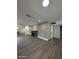 Spacious living room with fireplace, hardwood floors, and neutral wall colors at 333 W Bethany Home Rd, Phoenix, AZ 85013