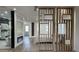 Open concept main bedroom with stylish wood divider, modern bathroom and fireplace at 333 W Bethany Home Rd, Phoenix, AZ 85013