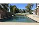 Luxurious pool and spa surrounded by mature trees, offering a private and tranquil outdoor retreat at 333 W Bethany Home Rd, Phoenix, AZ 85013