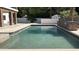 Sparkling pool with clear water, accented by lush greenery and a serene backyard ambiance at 333 W Bethany Home Rd, Phoenix, AZ 85013
