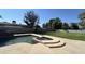 Refreshing pool and spa area with a charming backyard view, perfect for relaxation and recreation at 333 W Bethany Home Rd, Phoenix, AZ 85013