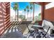 Balcony with beautiful view of surrounding palm trees at 3600 N Hayden Rd # 2816, Scottsdale, AZ 85251